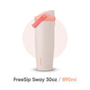 A light beige insulated stainless steel travel mug with an orange lid shown vertically.