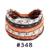 Boho knotted cotton headband in orange and black geometric print