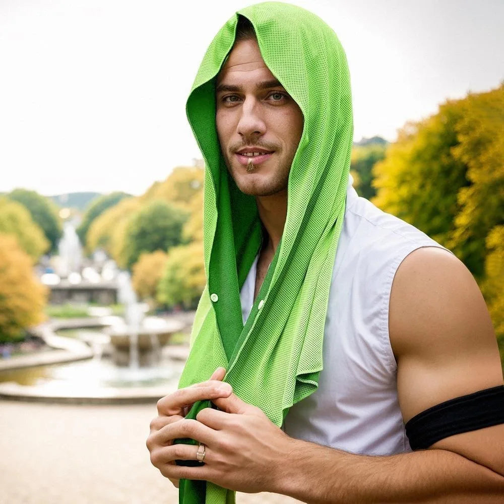 A man wearing a bright lime green instant cooling neck gaiter over a white shirt outdoors.