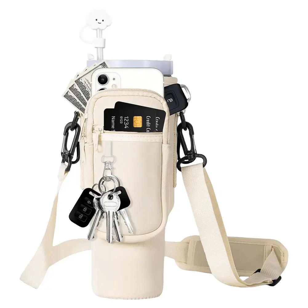 A beige neoprene water bottle carrier bag with a shoulder strap and attached keys is shown.