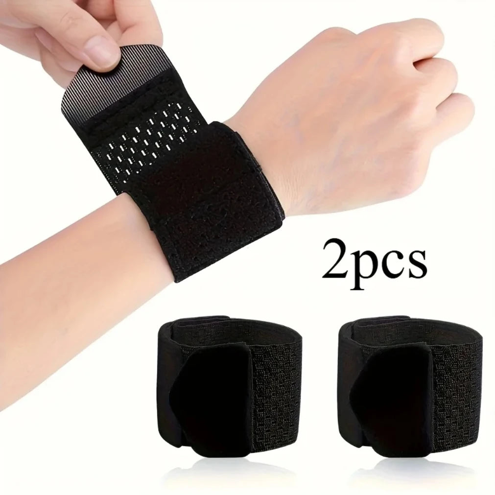 Two black ultra-thin wrist support straps shown being worn on a hand and laid out separately.