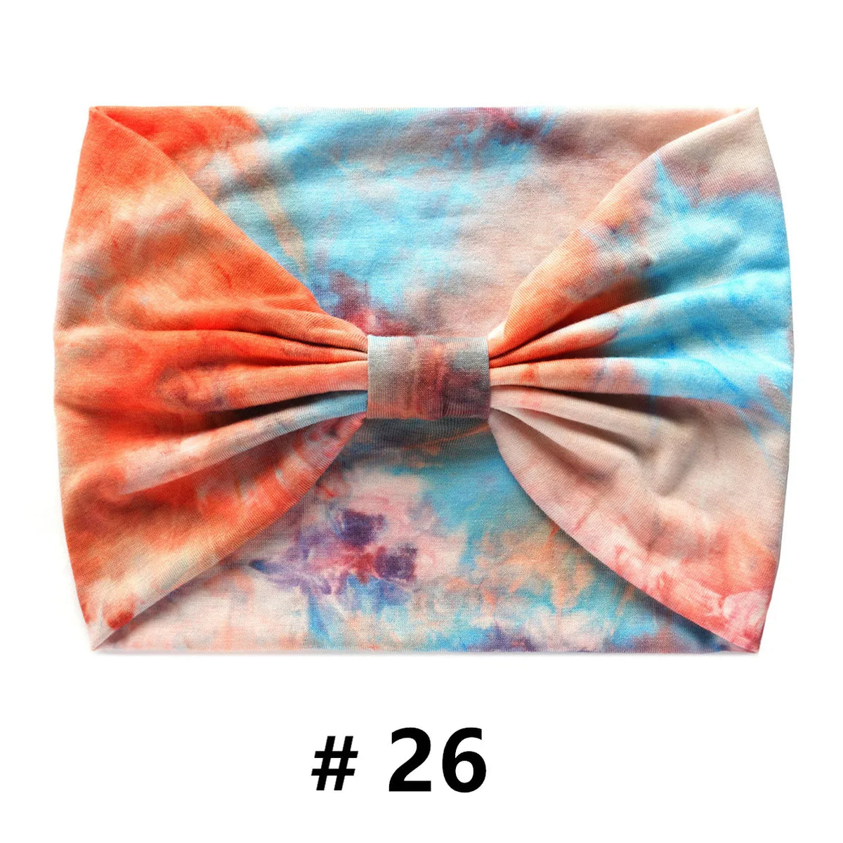 Bandeau en coton tie-dye orange, rose et bleu avec un nœud.