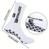 A pair of white non-slip football socks with black logo and knee pads shown from the side.