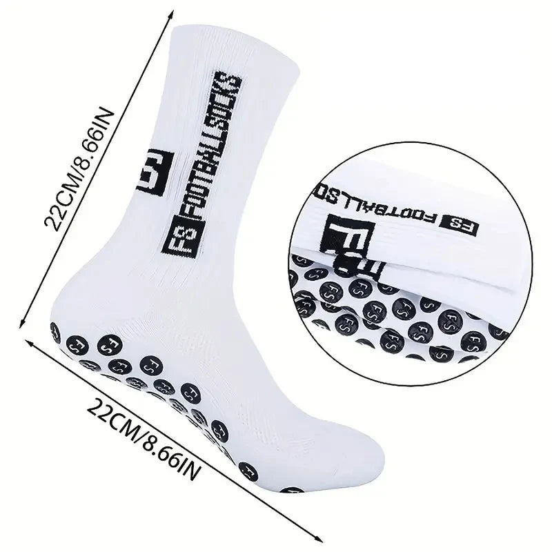 A pair of white non-slip football socks with black logo and knee pads shown from the side.