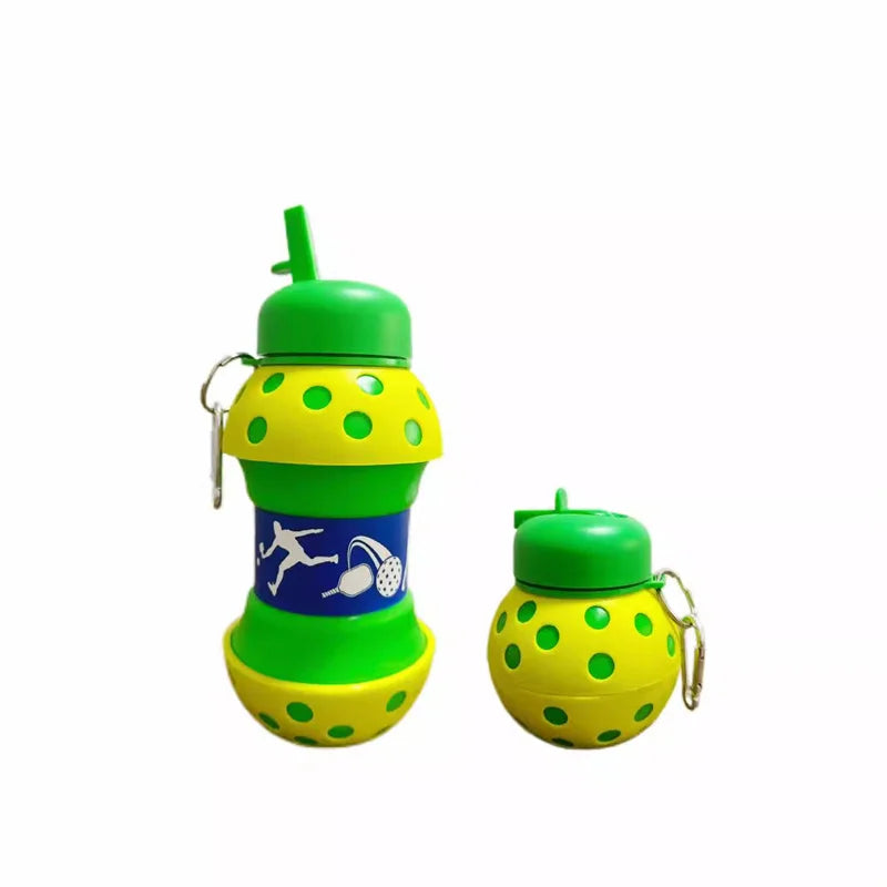 A bright green silicone sports water bottle with yellow polka dots and a green cap.