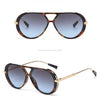 Hawksbill/Brown Blue sunglasses with gold accents shown in a studio shot.