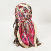 Elegant satin square scarf featuring a floral pattern in pink and green for hijab and hair