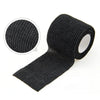 Black self-adhesive elastic bandage tape rolled and laid out with an inset showing the texture.