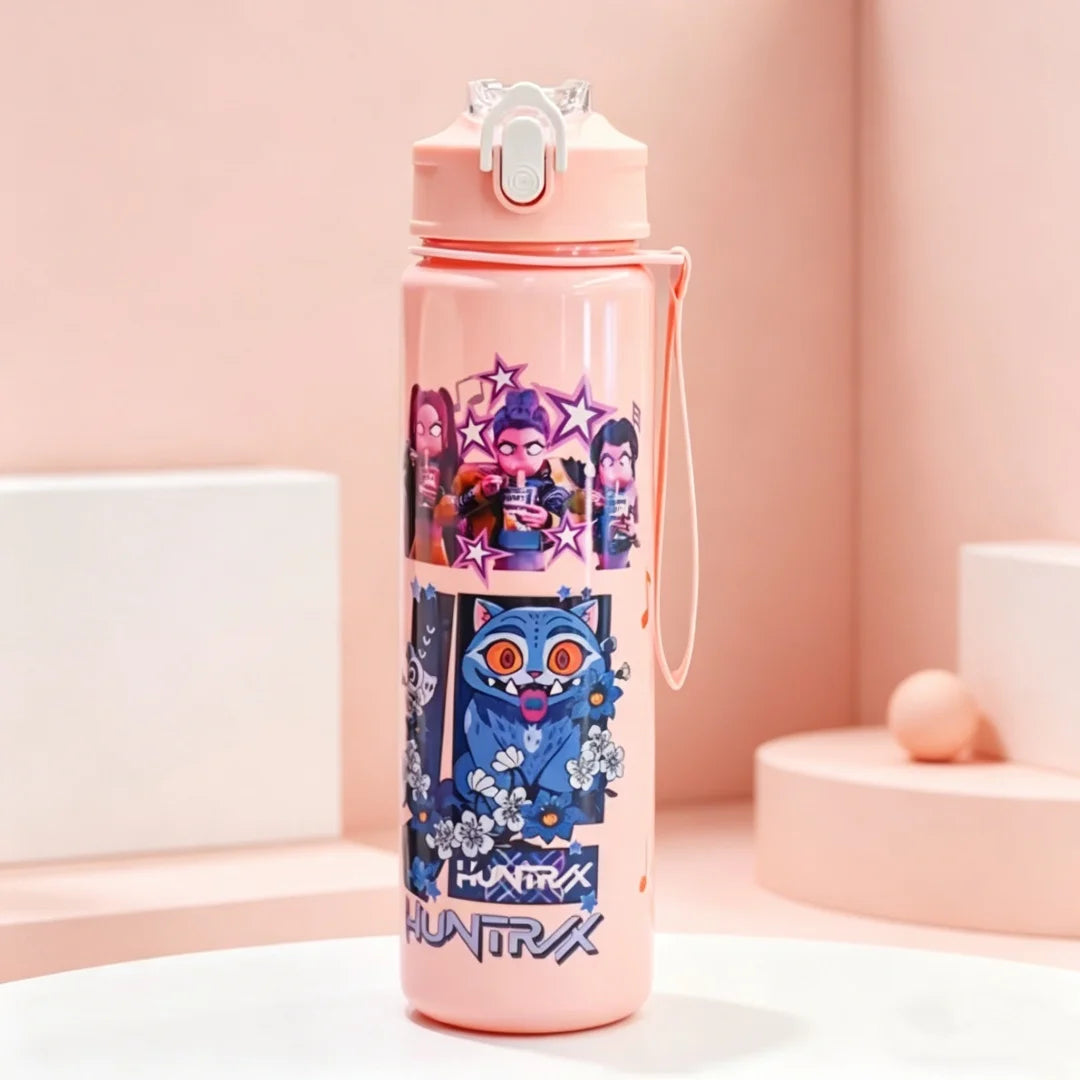 A pink cartoon character water bottle with a silver cap and carrying strap standing on a white surface.