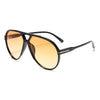 Pilot-Stil UV400-Gradienten-Sonnenbrille mit dunklem Rahmen und bernsteinfarbenen Linsen