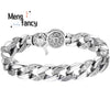 A silver mantra charm bracelet featuring interlocking links and a central charm.