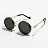 Gold-toned frame round sunglasses with black lenses and adjustable dimming feature