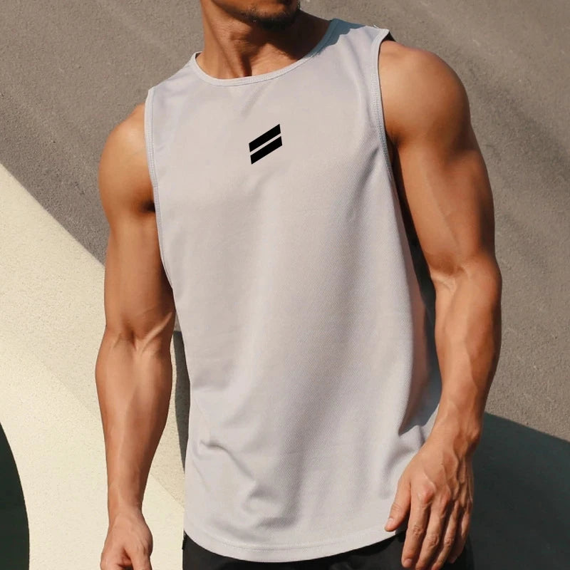A muscular man wearing a light gray sleeveless sports tank top with black stripes on his upper body.
