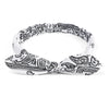 White and black paisley print elastic hair headbands tied in a bow