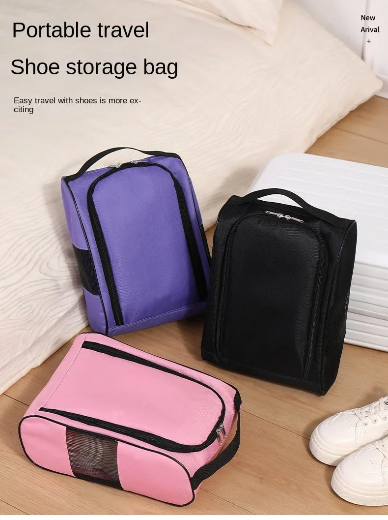 A purple, black, and pink shoe storage bag is shown next to a pair of white shoes on a wooden surface.