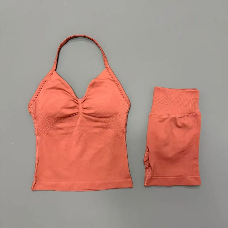 A terracotta orange women's seamless backless fitness set top and bottom.