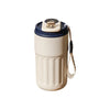 A beige insulated thermos bottle with a dark blue lid and a temperature display.