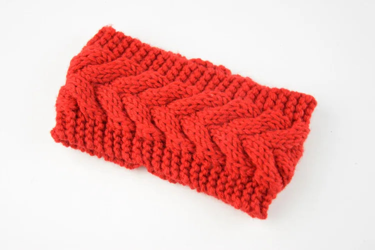 Diadema de punto rojo brillante con patrón de ribete texturizado.