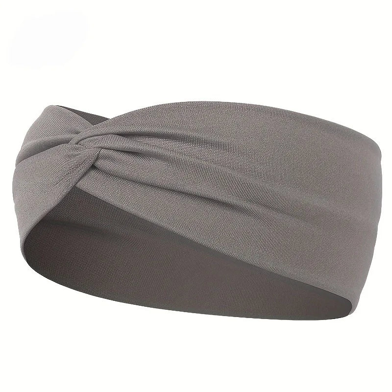 A gray knotted elastic sports headband is shown from the side.