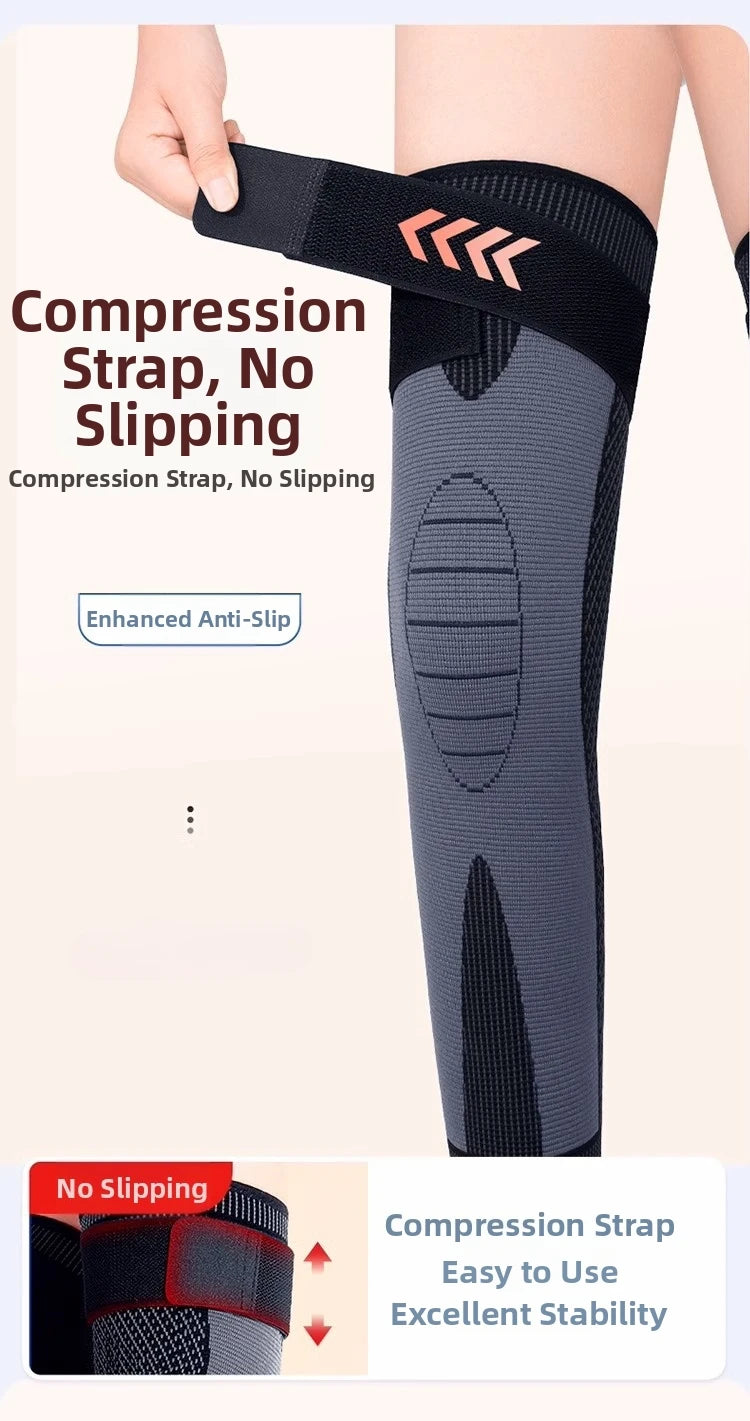 A hand is demonstrating a black compression strap on a gray knee sleeve, highlighting its anti-slip feature.