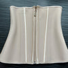 A beige double compression waist trainer corset body shaper with a zipper closure.