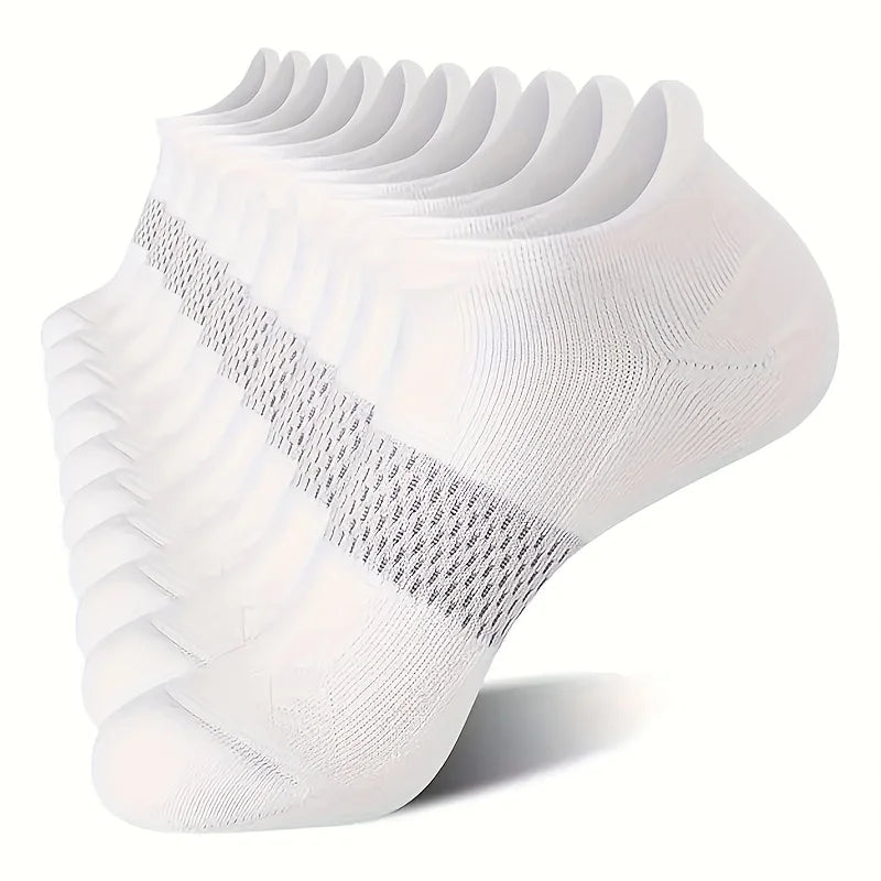A pair of white performance compression ankle socks folded and displayed on a white background.