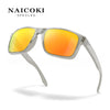 A pair of silver-framed sunglasses with bright orange-yellow polarized lenses shown against a white background.