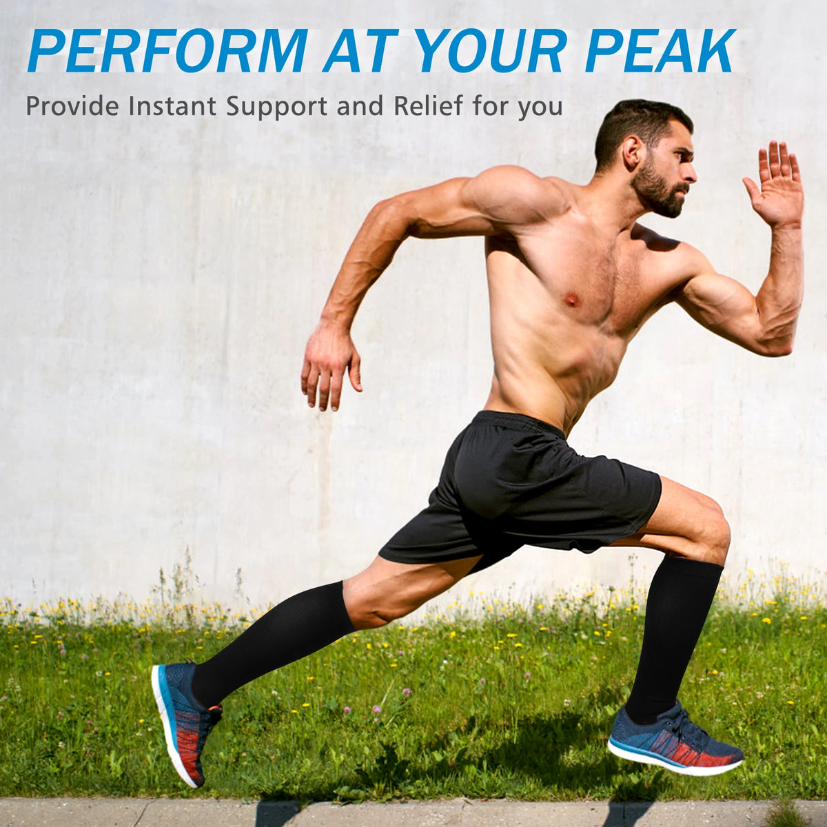 A muscular man is running outdoors, wearing black compression socks and athletic shorts.