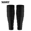 A pair of black compression leg sleeves designed for pain relief.