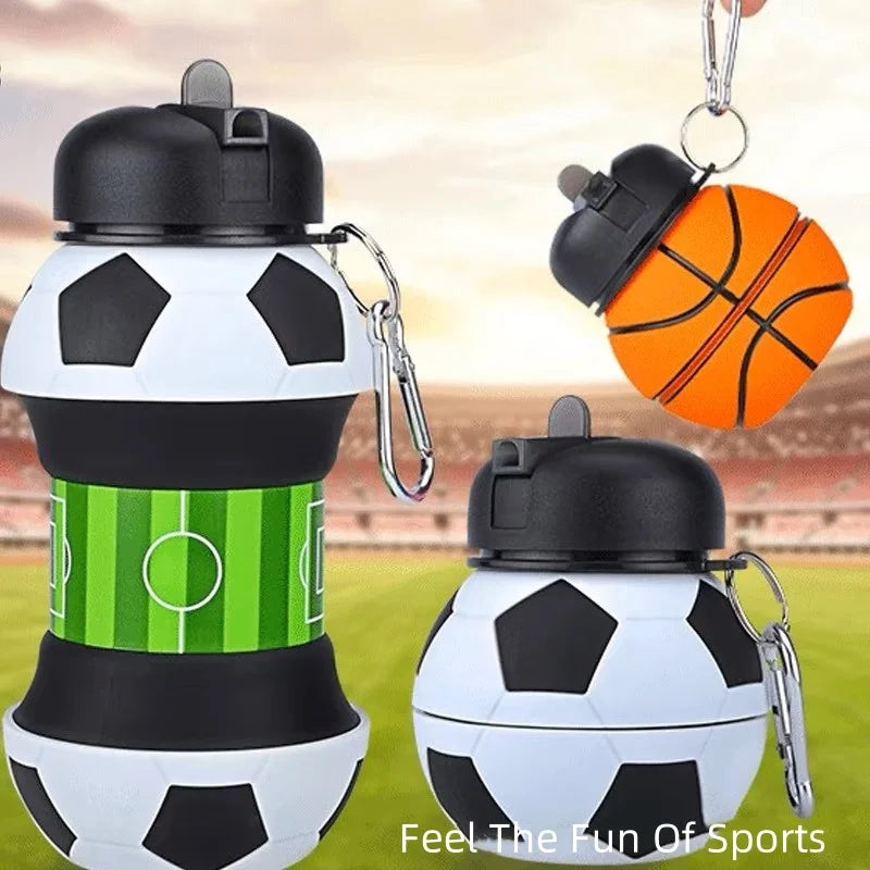 A black and white soccer ball shaped water bottle with an orange basketball attached, demonstrating the fun of sports.
