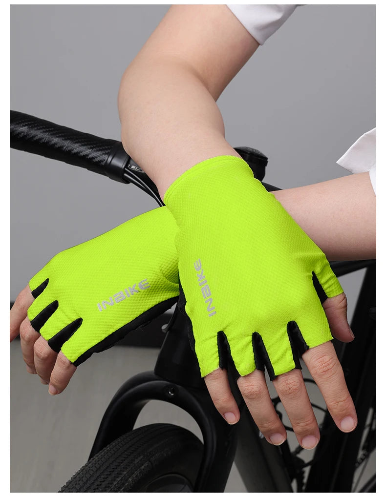 Bright neon yellow half-finger cycling gloves worn on a hand, ready for summer riding.