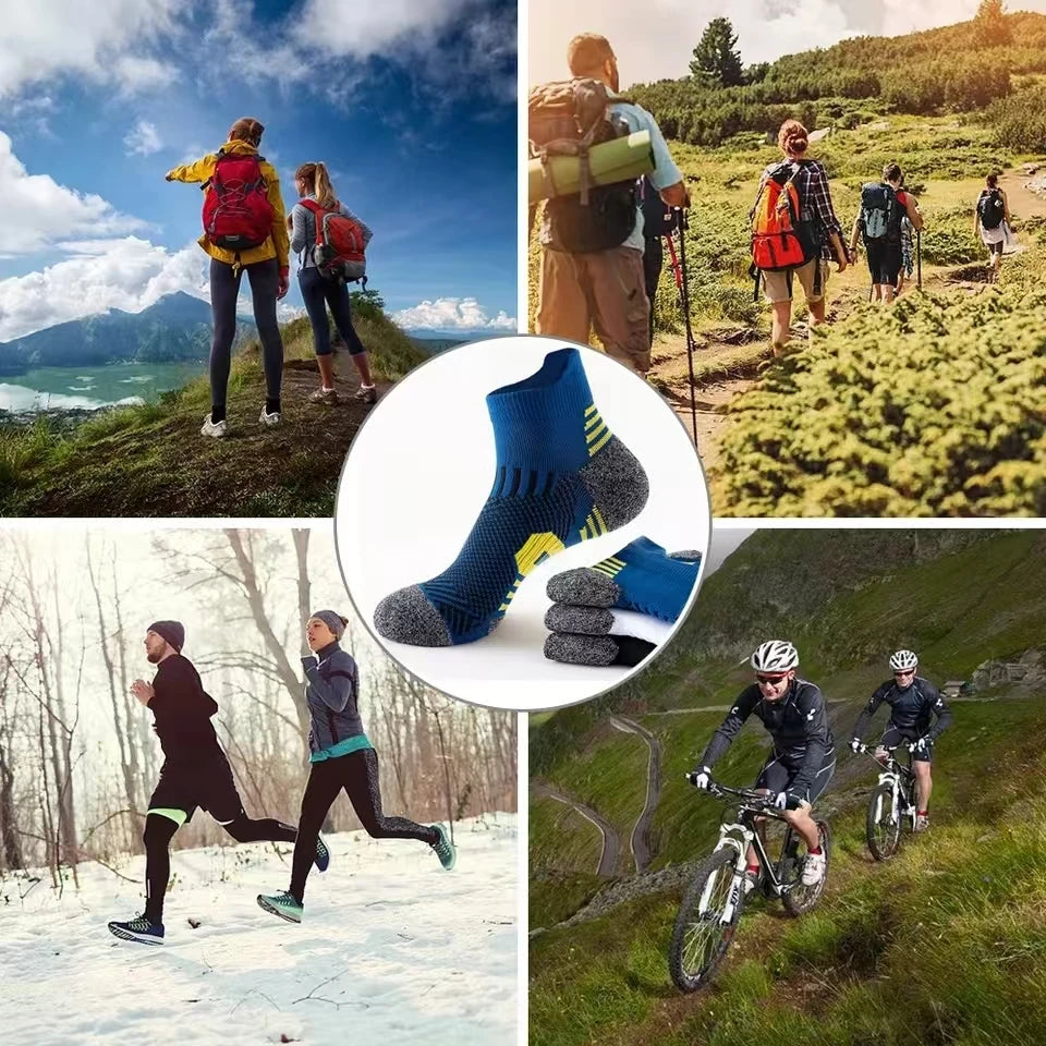 A collection of blue and gray performance running socks being worn by hikers in a mountainous outdoor setting.