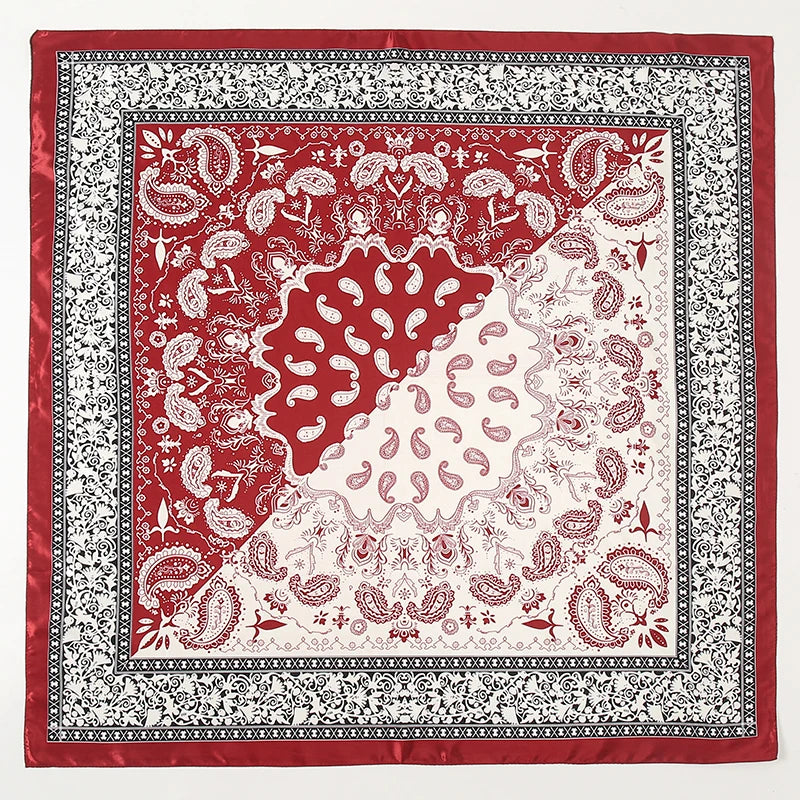 A square red and white patterned satin scarf featuring intricate paisley designs for hijab or hair