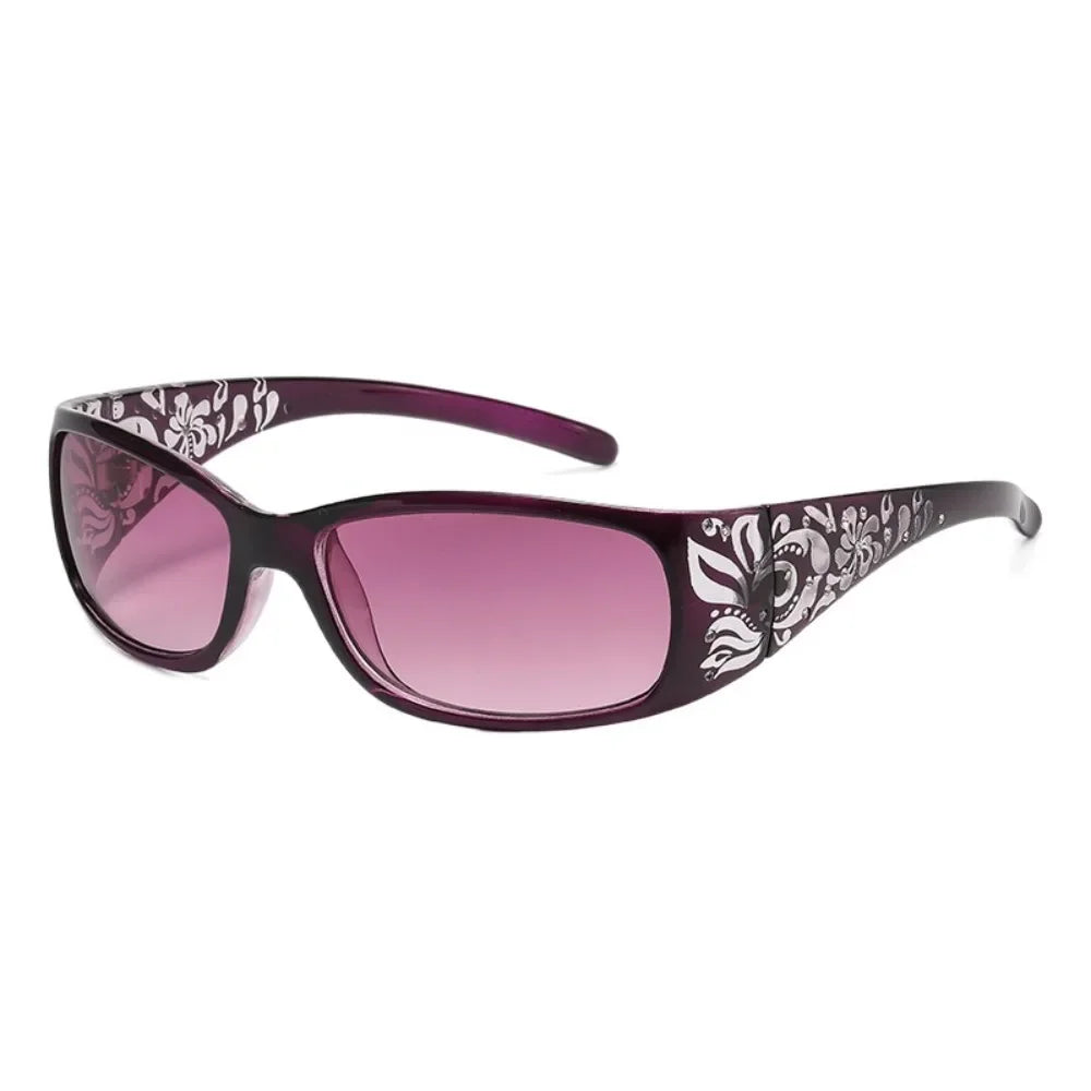Purple Y2K cat eye rhinestone sunglasses with a floral pattern