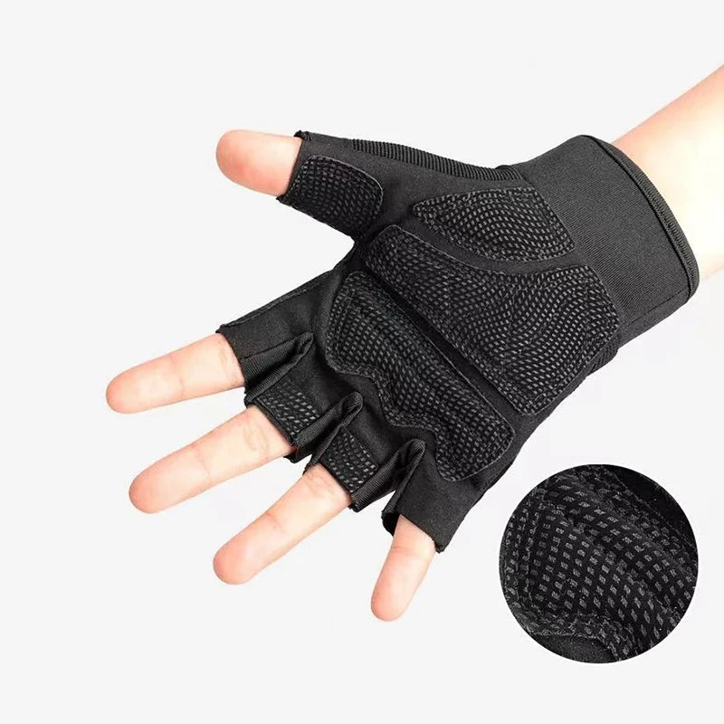 Black half-finger anti-slip outdoor gloves being worn on a hand.