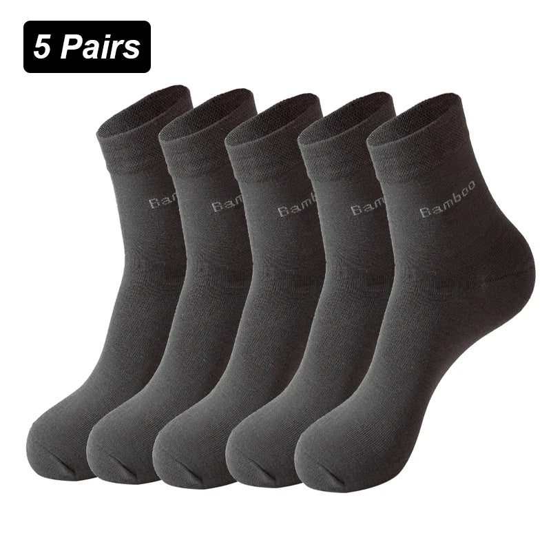 Five pairs of dark gray bamboo fiber socks laid out for display.