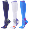 Three pairs of medical grade compression socks in navy blue, white, and bright blue.