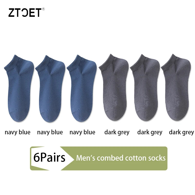 A set of six pairs of navy blue and dark grey men's combed cotton socks displayed side by side.
