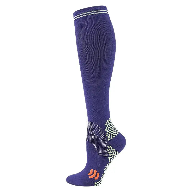 A close-up view of a navy blue medical grade compression sock with a patterned toe and cuff.