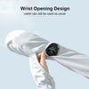 A hand is putting a watch onto the wrist of a white arm sleeve for sun protection.