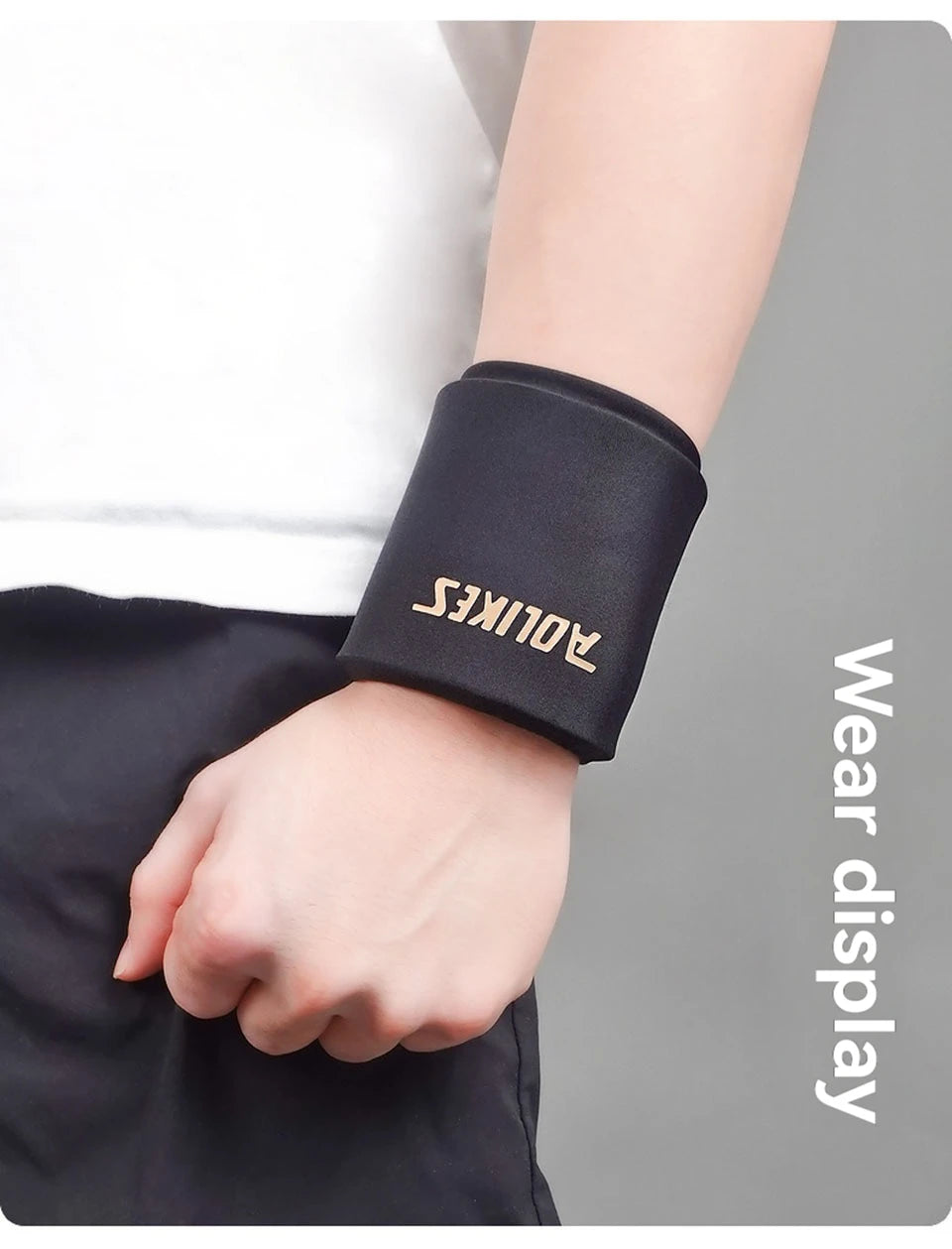 A close-up of a black sports sleeve with the brand name AOLIKES on the wrist.