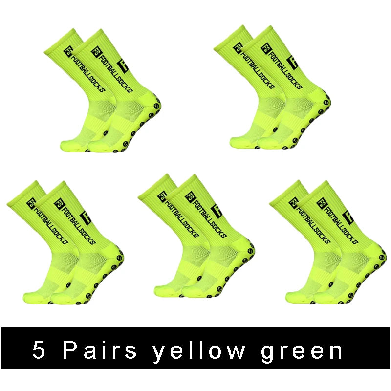 Five pairs of yellow green anti-slip silicone grip football socks displayed in various angles.