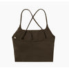 A dark brown women's performance tracksuit set top with criss-cross straps.
