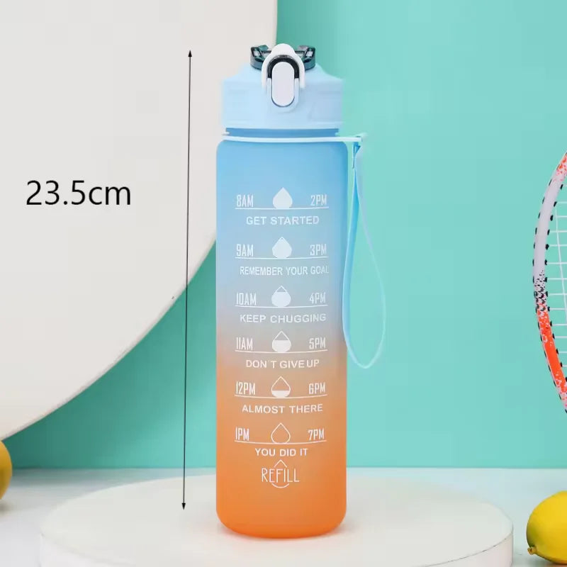 An orange sports water bottle with a blue cap and straw, featuring time-based motivational markings.