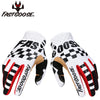 A pair of white and black cycling gloves with red accents shown from above.