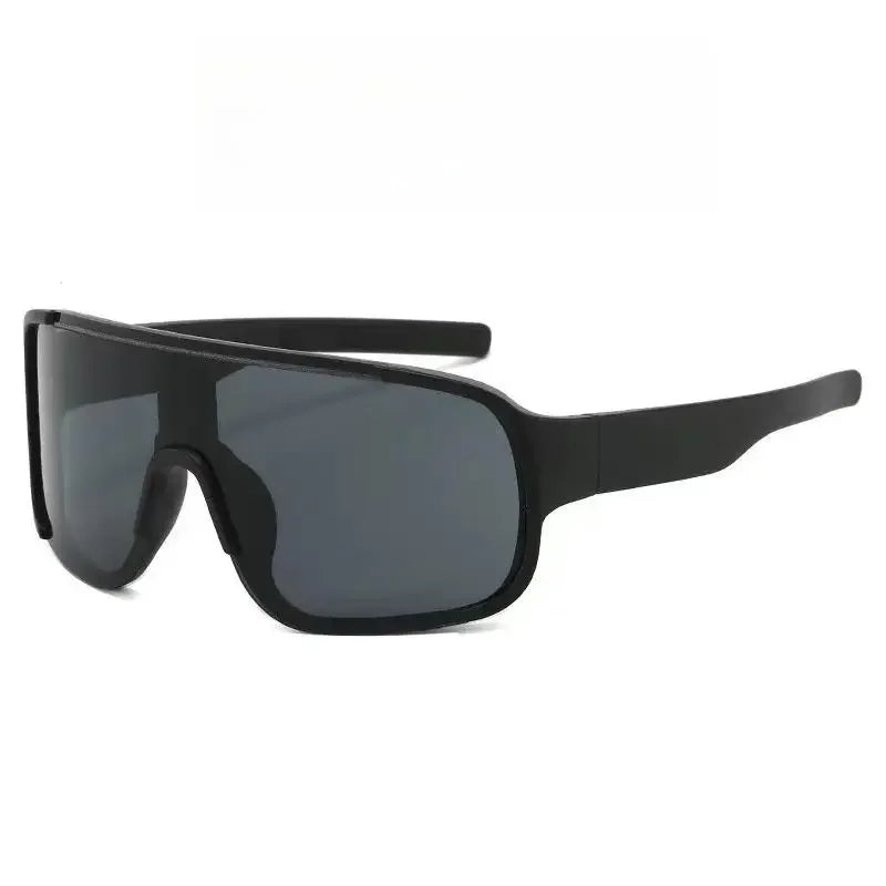 Black sports sunglasses with dark lenses shown against a white background.