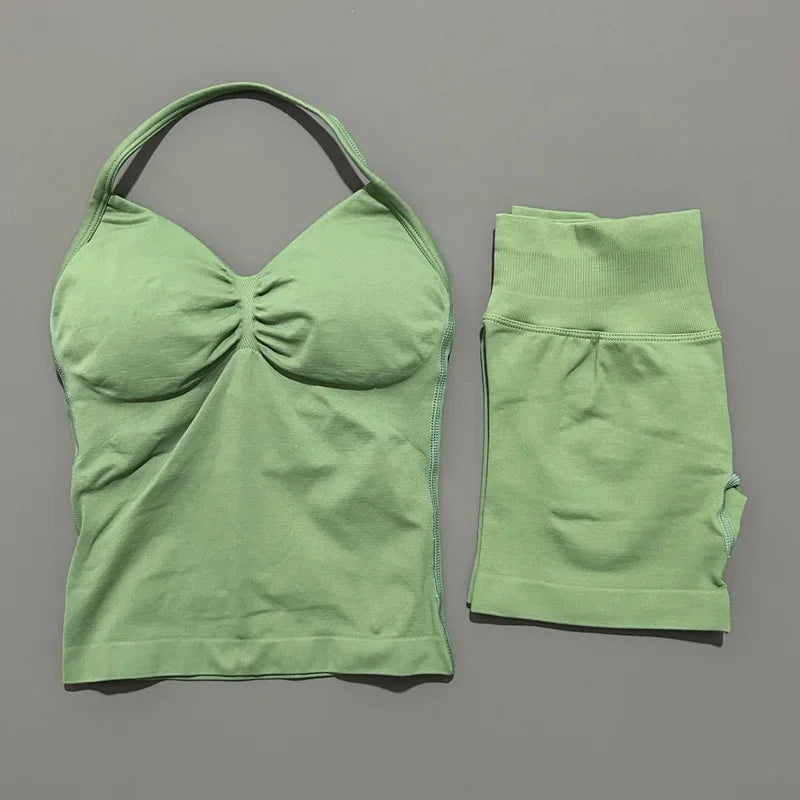 A lime green women's seamless fitness set consisting of a cropped top and matching leggings.