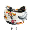 Bandeau en coton stretch à motif floral boho noir et blanc.