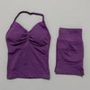 A purple women's seamless backless fitness set top and bottom shown against a light gray background.