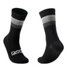 A pair of black cycling socks with a grey stripe detail, shown from the side.